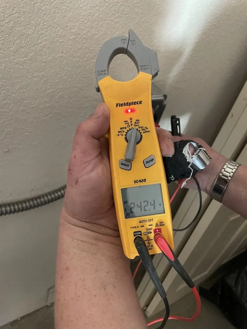 Voltage testing with clamp meter during Generator Installation in Iona